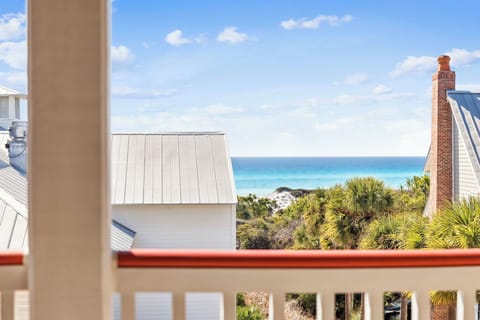 Ocean views frame your stay with turquoise waters and swaying palms visible from your balcony.