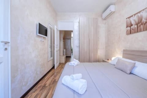 Traditional Apartment | Premium bedding, down comforters, travel crib, free WiFi
