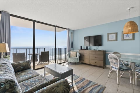 The ocean front living room is well-appointed with comfortable furnishings.