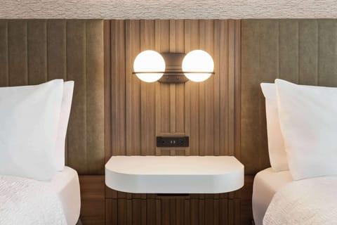 Blackout drapes, iron/ironing board, free rollaway beds, free WiFi