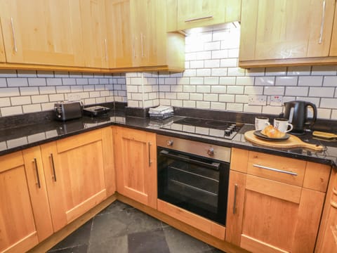 Fridge, electric kettle, toaster, cookware/dishes/utensils