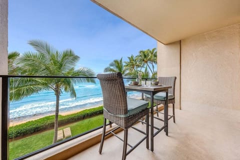 Relax on a private balcony overlooking the sparkling Pacific Ocean