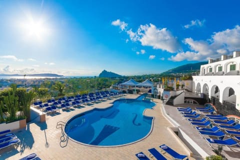 Indoor pool, outdoor pool, open 8:00 AM to 7:00 PM, pool umbrellas