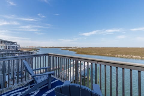 Your private balcony offers stunning water views where you can unwind with morning coffee or evening cocktails overlooking the peaceful bay.