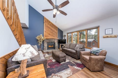 Warm & welcoming living room with gas fireplace and great views. New Furniture!!