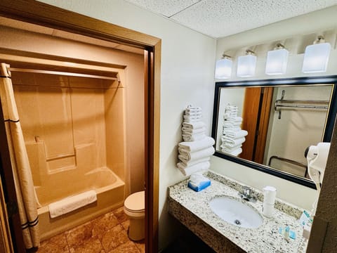 Desk, blackout drapes, iron/ironing board, free cribs/infant beds