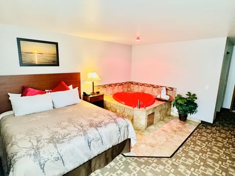 Standard Room, 1 King Bed, Non Smoking, Jetted Tub | Desk, blackout drapes, iron/ironing board, free cribs/infant beds