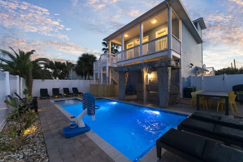 Relax by the illuminated rock waterfall or take a latenight swim under the stars