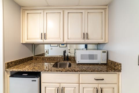 Your mother in law suite has a mini-kitchen and a separate entry.