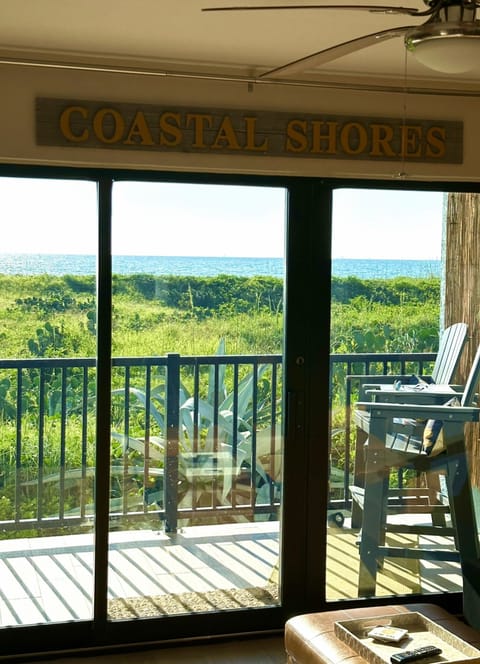 GORGEOUS view of the ocean from the high, comfortable Adirondack chairs….
