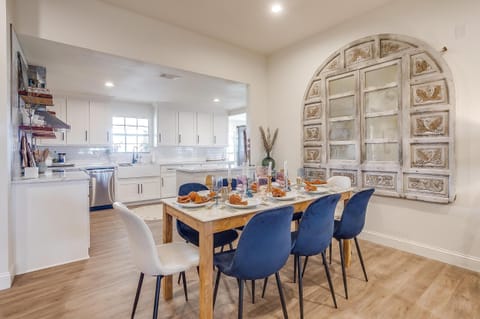 Dining area with open kitchen view at The Blanc

