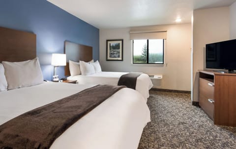 Premium bedding, pillowtop beds, desk, laptop workspace