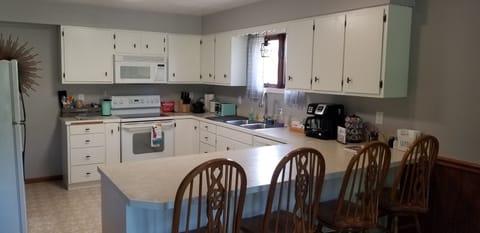 Spacious kitchen with island seating for four