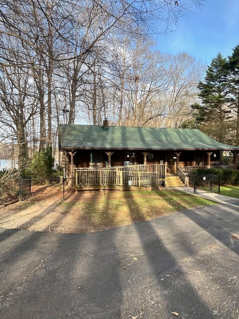 The cabin! Handicap ramp leads to the front door. Fenced yard for furry friends!