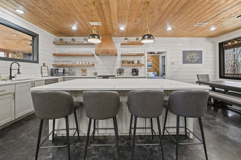 Kitchen: Bright, airy space with modern finishes, ideal for culinary adventures! Enjoy the view!area