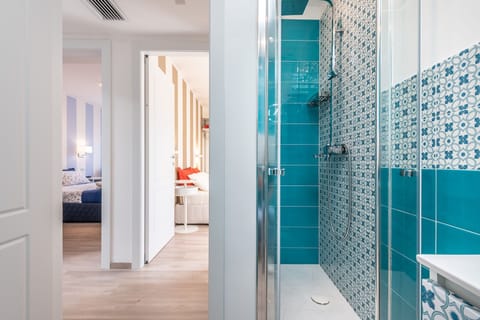 Comfort Room, 1 Queen Bed | Bathroom | Shower, rainfall showerhead, hair dryer, soap