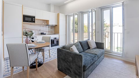 Stylish open-plan space featuring the kitchenette, dining and living area, flowing out to a private balcony — beautifully decorated for a seamless stay.

#stylish #openplanliving #balconyvibes #lovelystay