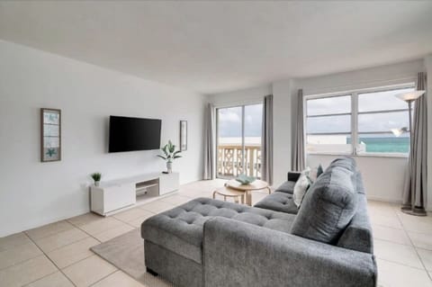 Where comfort meets style, your perfect living room retreat awaits you.
