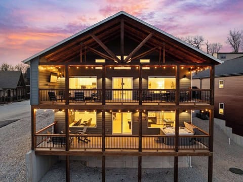 Upper Deck - Outdoor TV, Fireplace, Dining Table
Lower Deck - Private Hot Tub and Outdoor Seating