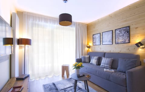 Sink into the cozy sofa after a fun-filled day.