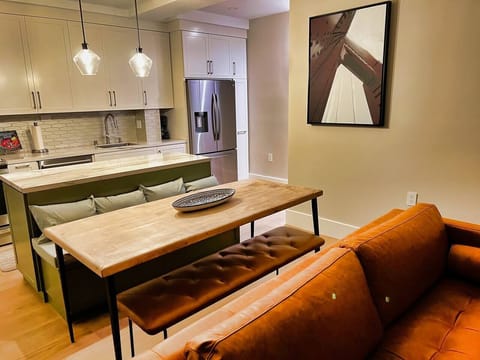 Dining area in open-floor plan kitchen/dining/living great room. Seating for 6 comfortably + 8-10 in a pinch. 