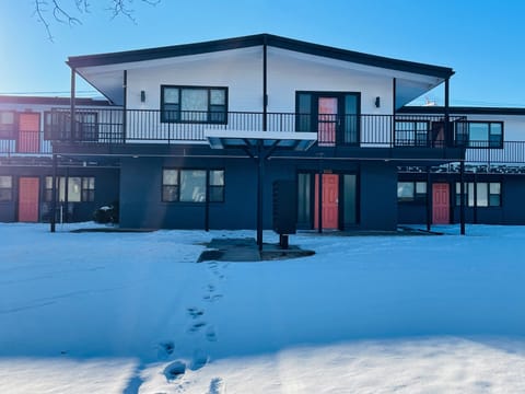 Exterior front entrance downstairs. Balcony access upstairs.