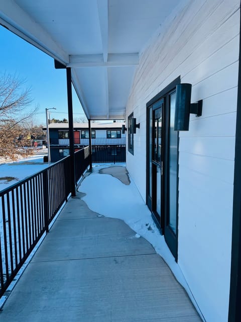 Upstairs balcony, outdoor furniture provided.