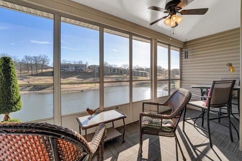 Relax with this beautiful view of the Pointe golf course in the screened in porch!