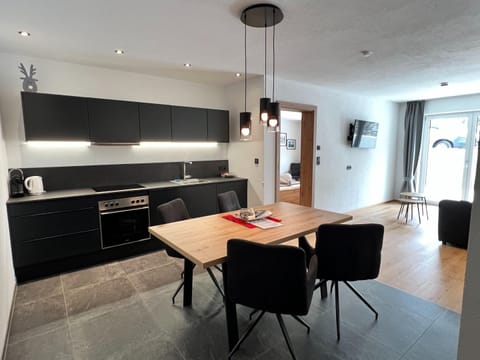 Apartment | Private kitchen | Stovetop, dishwasher, coffee/tea maker