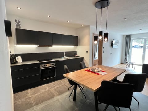 Apartment | Private kitchen | Stovetop, dishwasher, coffee/tea maker