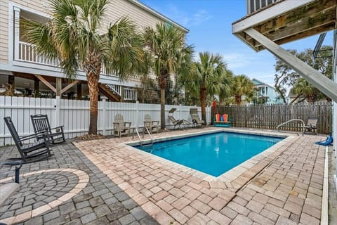 Your private pool oasis awaits, surrounded by swaying palms and comfortable loungers for perfect relaxation days.