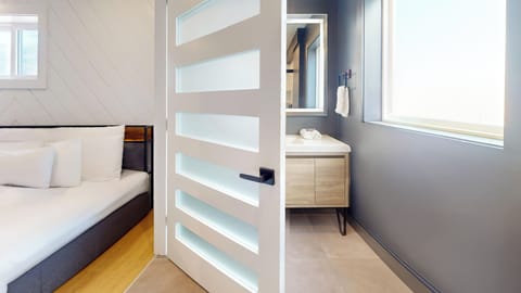 Signature Room, 2 Double Beds | Bathroom | Shower, towels, soap, shampoo