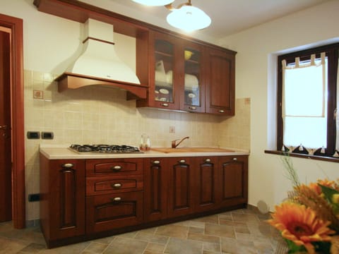 Villa | Private kitchen | Electric kettle, highchair
