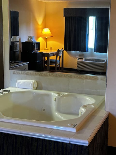 Standard Suite, 1 King Bed | In-room safe, desk, iron/ironing board, free WiFi