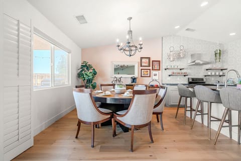 Dining table seats 6 comfortably or kitchen island seats 3 for easy meals