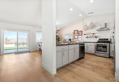 Kitchen has island with seating to keep the chef company. Great for entertaining