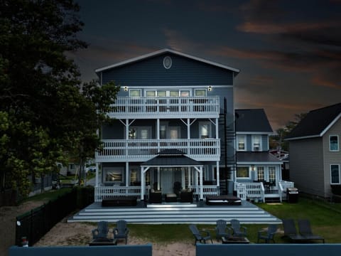 A grand house with a plethora of balconies, offering stunning views from every angle.