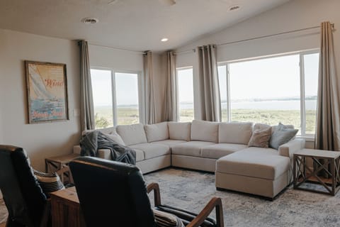 Large sectional for all your friends and family to gather to take in the 180 degree lake views!