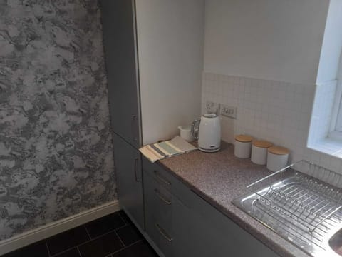 Kitchen area showing Fridge Freezer
