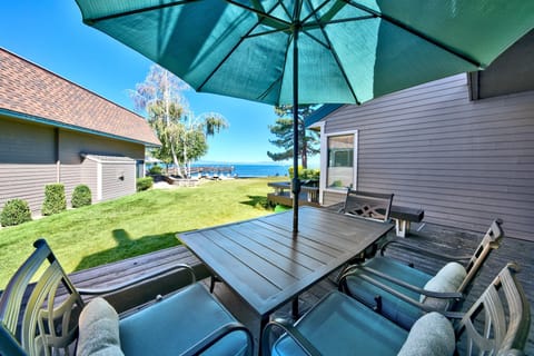 Your private terrace offers stunning lakefront views where you'll dine under shade while watching boats glide across crystal-clear waters.