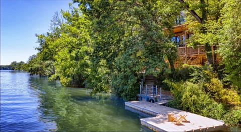 Drone view of the Chalet du Carla by the water - Private pontoon perfect for relaxing by the river