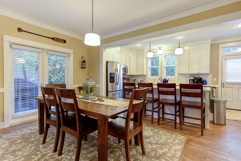 Gather around the dining table for meals and laughter