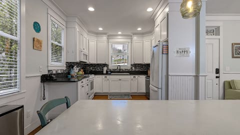 The kitchen is equipped with a gas range