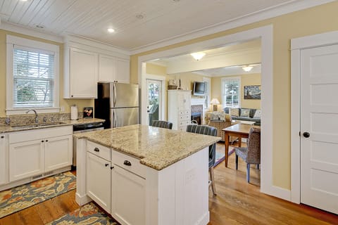 The cozy breakfast bar is perfect for coffee, conversation and quick bites