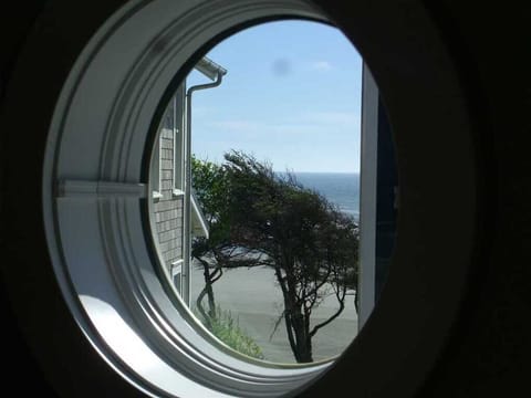 You can enjoy peekaboo views of the ocean and your walk on the beach is about a minute away