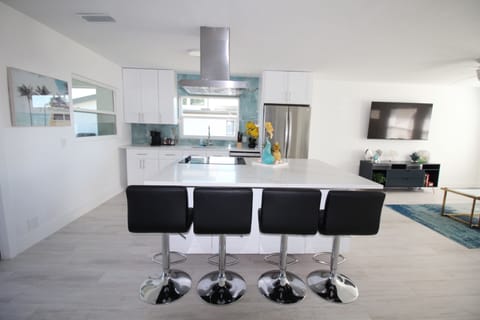 Full Kitchen equipped with all essentials you need for cooking and dinning.