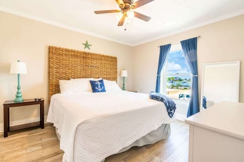 Full bedroom with TV, Dresser, Closet