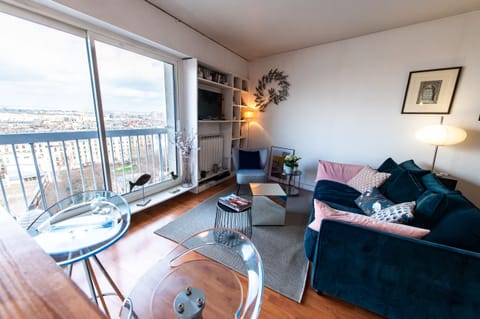 Living room offers a breath-taking view over the city.