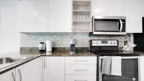 Kitchen appliances and cookware provided for guests to use!