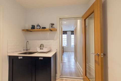 Kitchen looking through to dining room